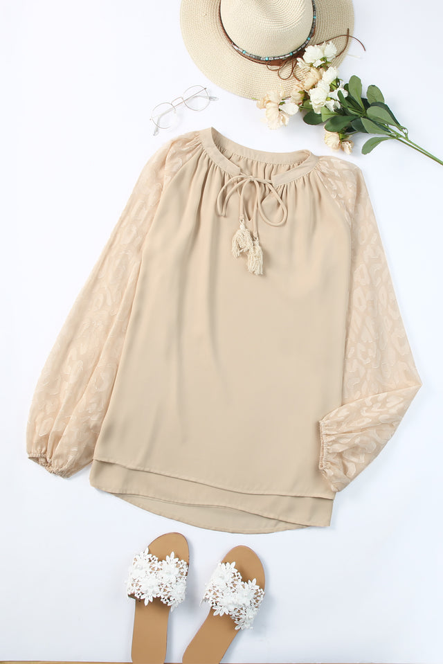 Tassel Tie Neck Long Sleeve Blouse.