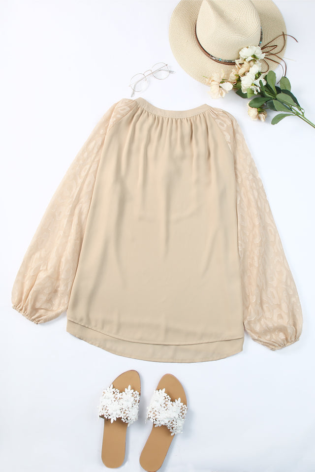 Tassel Tie Neck Long Sleeve Blouse.