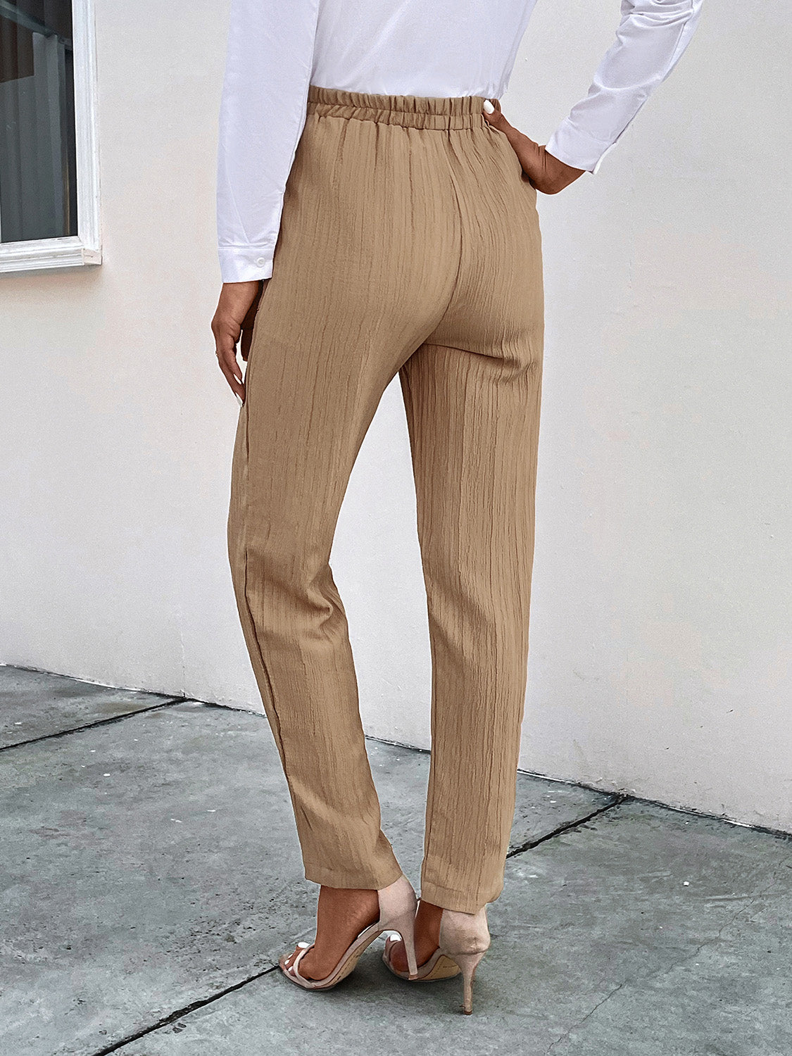 Texture drawstring pants with pockets, opaque.