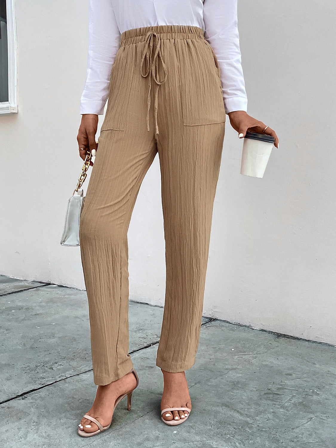 Texture drawstring pants with pockets, opaque.