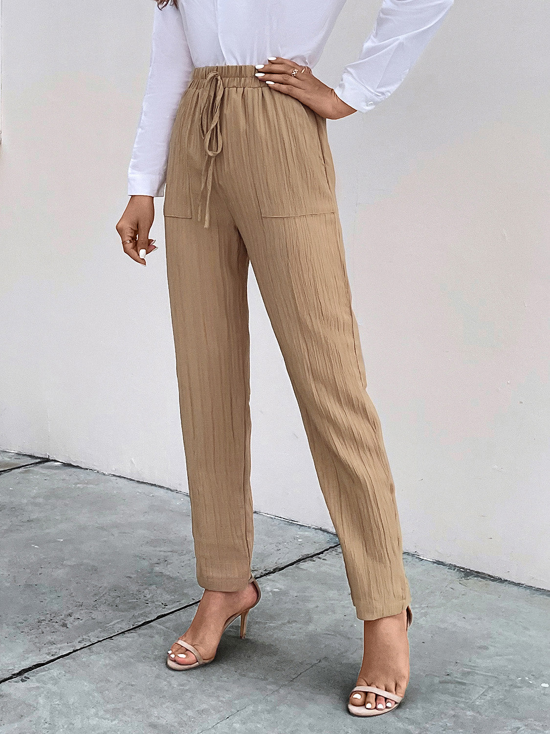 Texture drawstring pants with pockets, opaque.