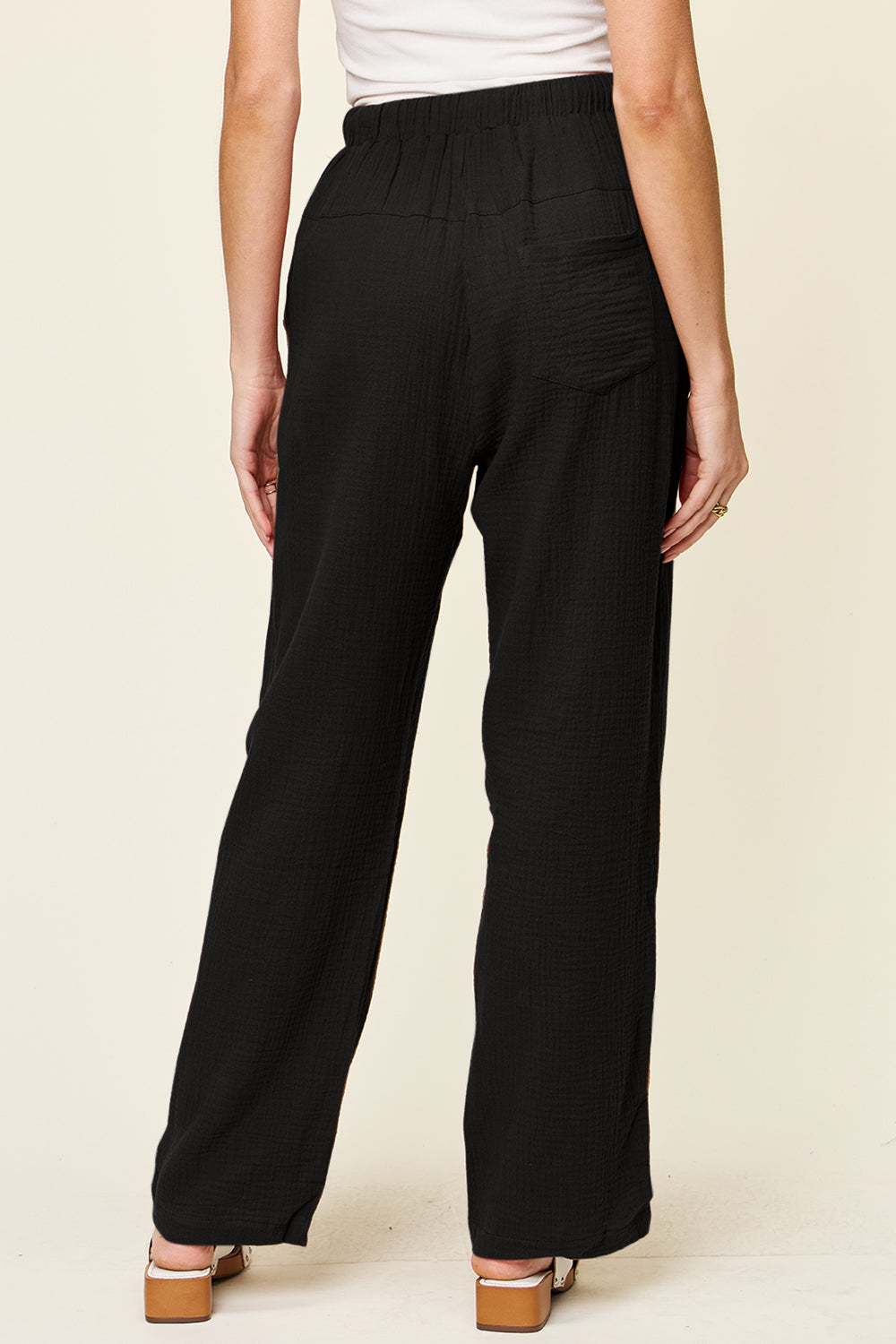 Texture drawstring straight pants with pockets, opaque.