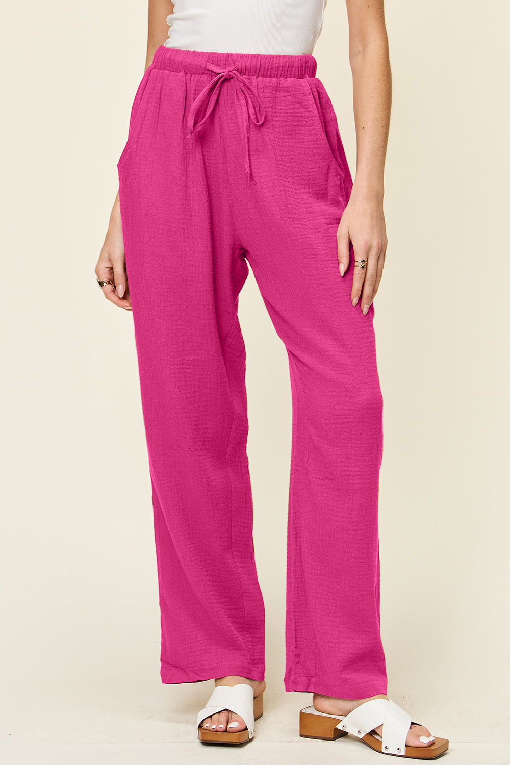 Texture drawstring straight pants with pockets, opaque.
