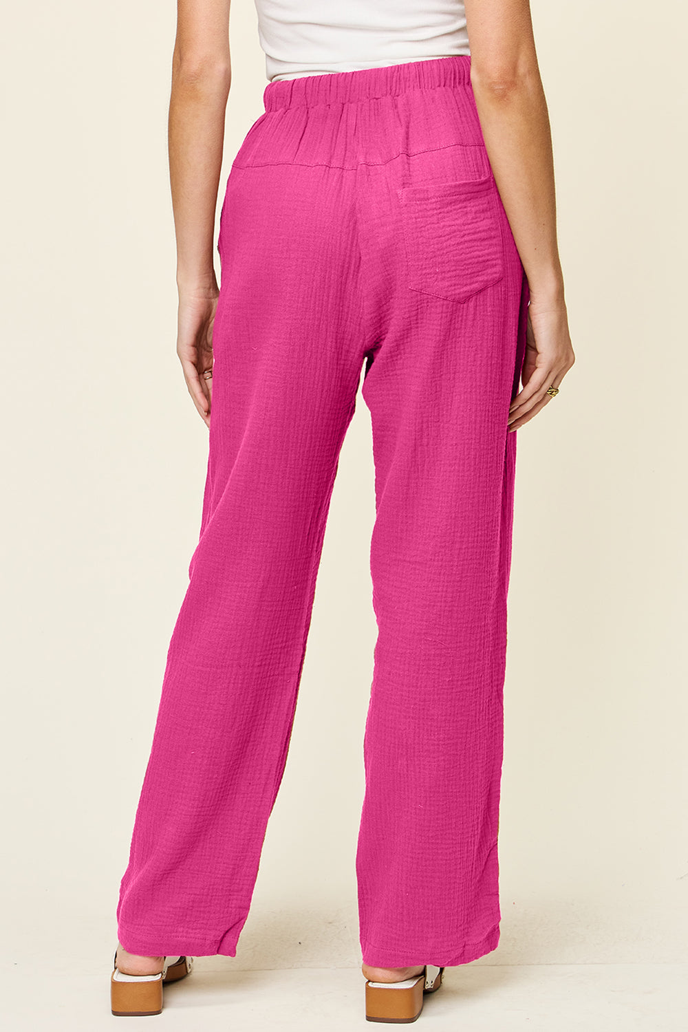 Texture drawstring straight pants with pockets, opaque.