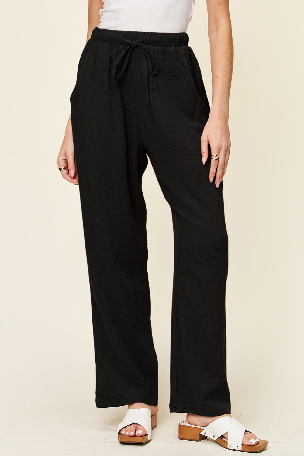 Texture drawstring straight pants with pockets, opaque.