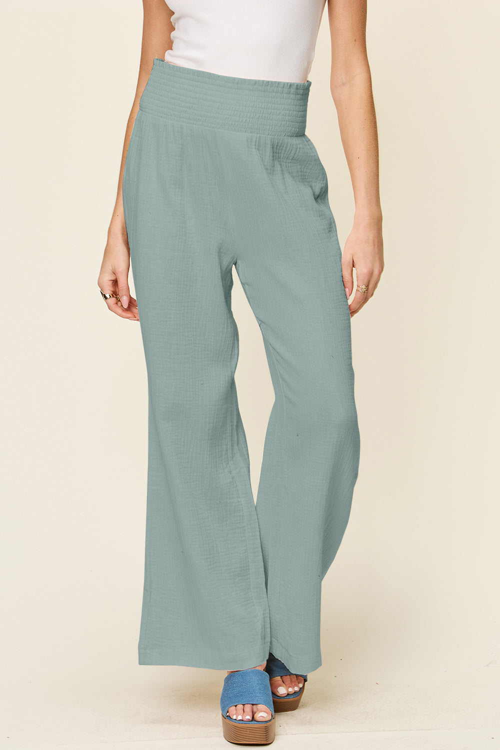 Texture smocked waist wide leg pants, opaque.