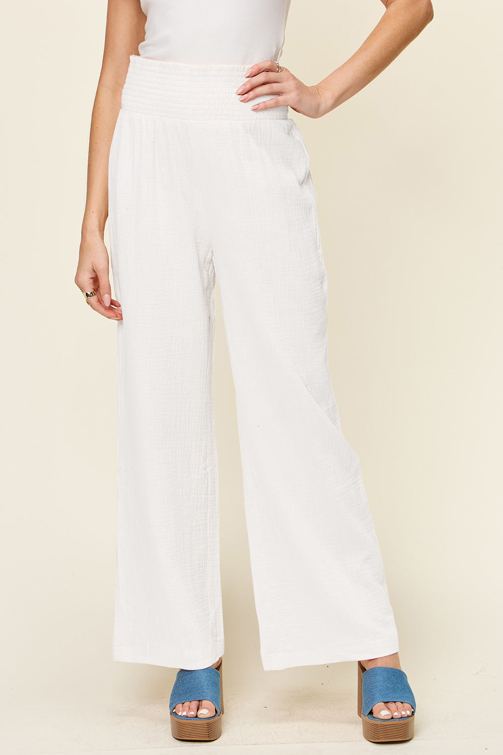 Texture smocked waist wide leg pants, opaque.