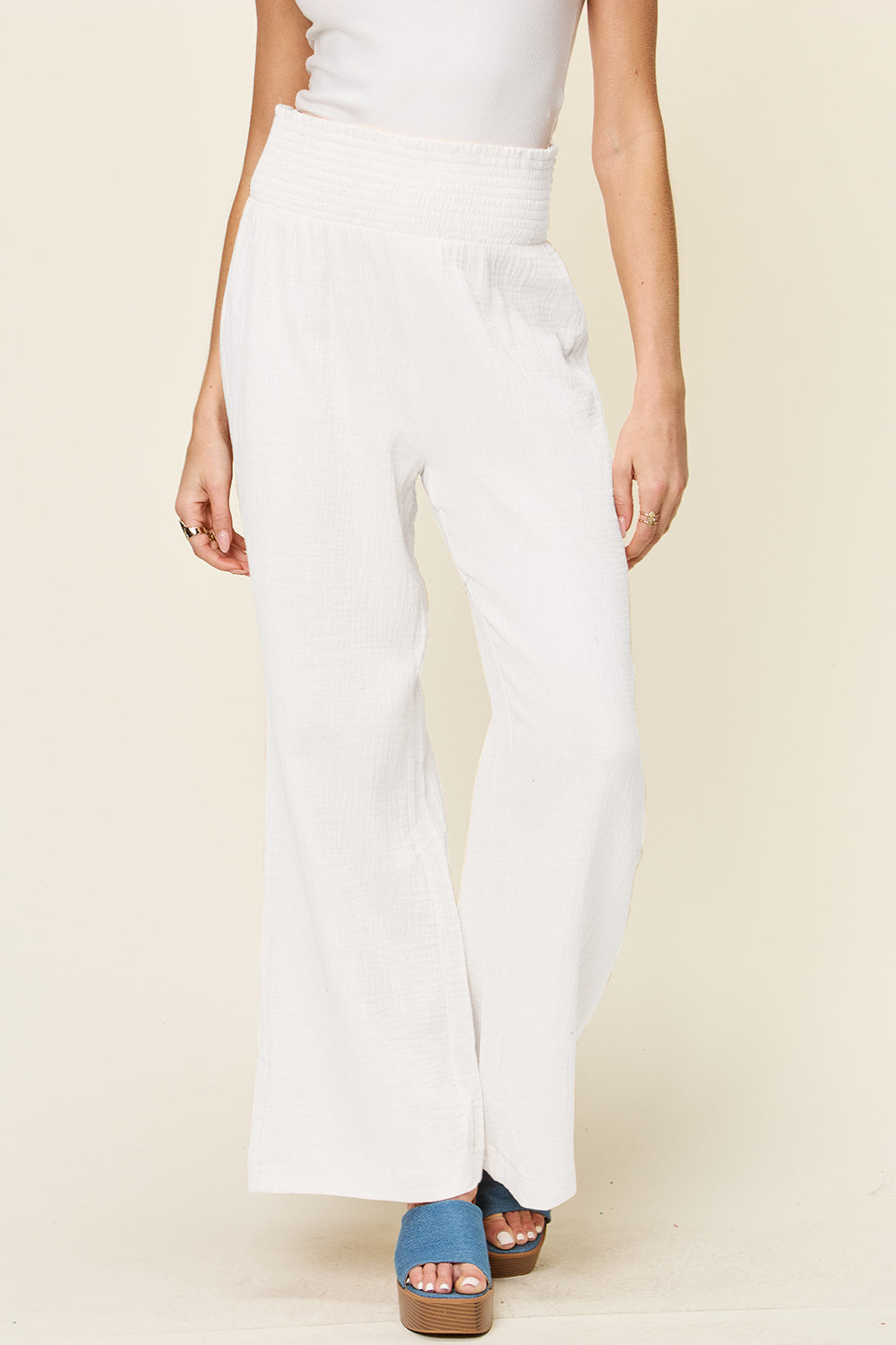 Texture smocked waist wide leg pants, opaque.