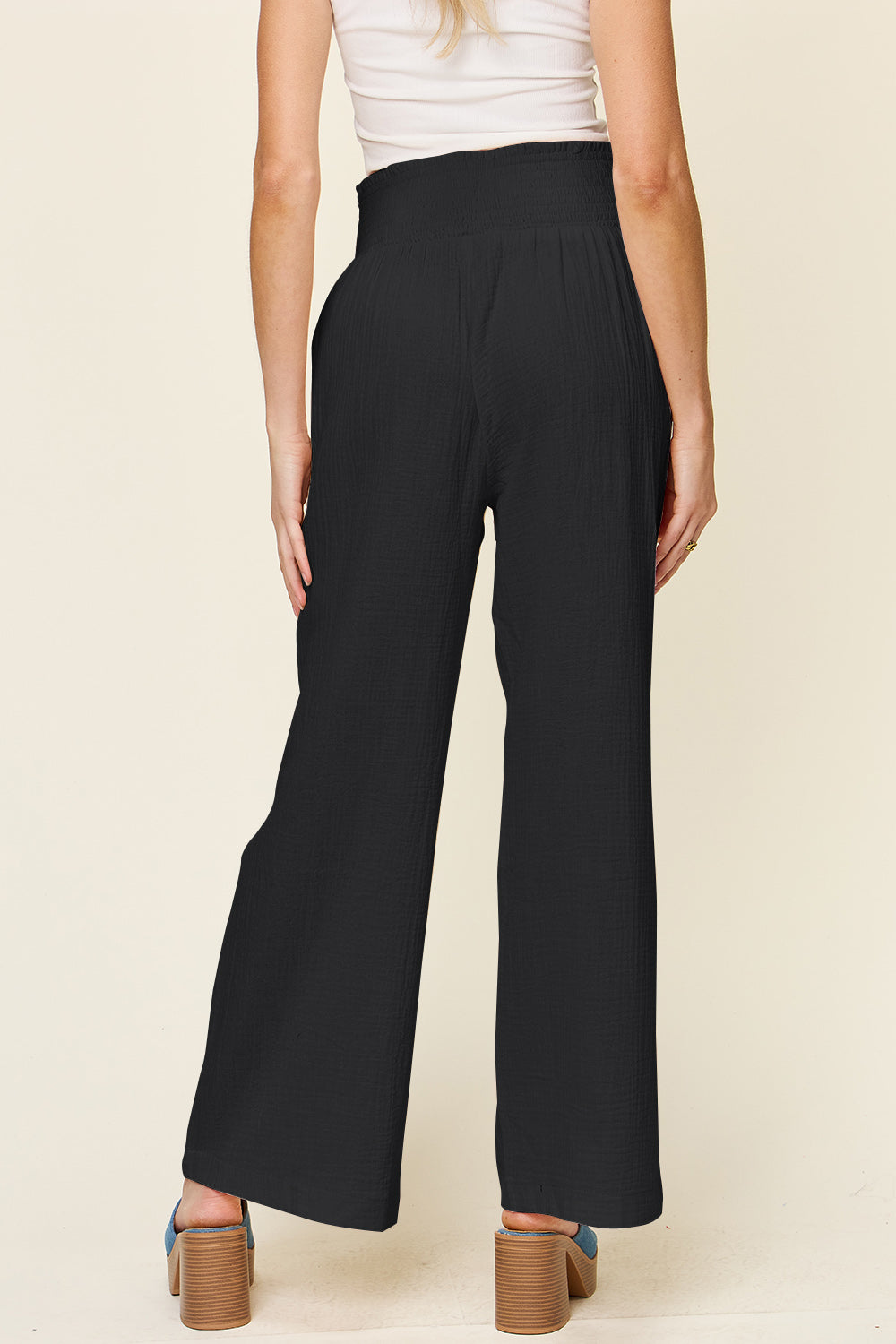 Texture smocked waist wide leg pants, opaque.