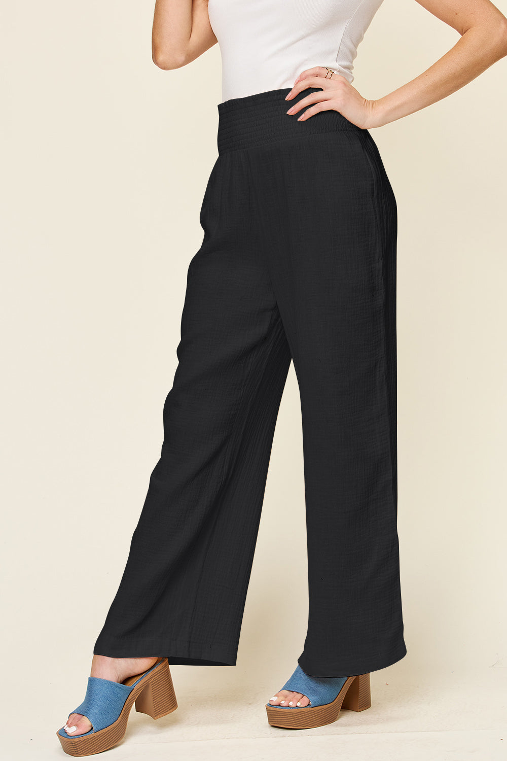 Texture smocked waist wide leg pants, opaque.