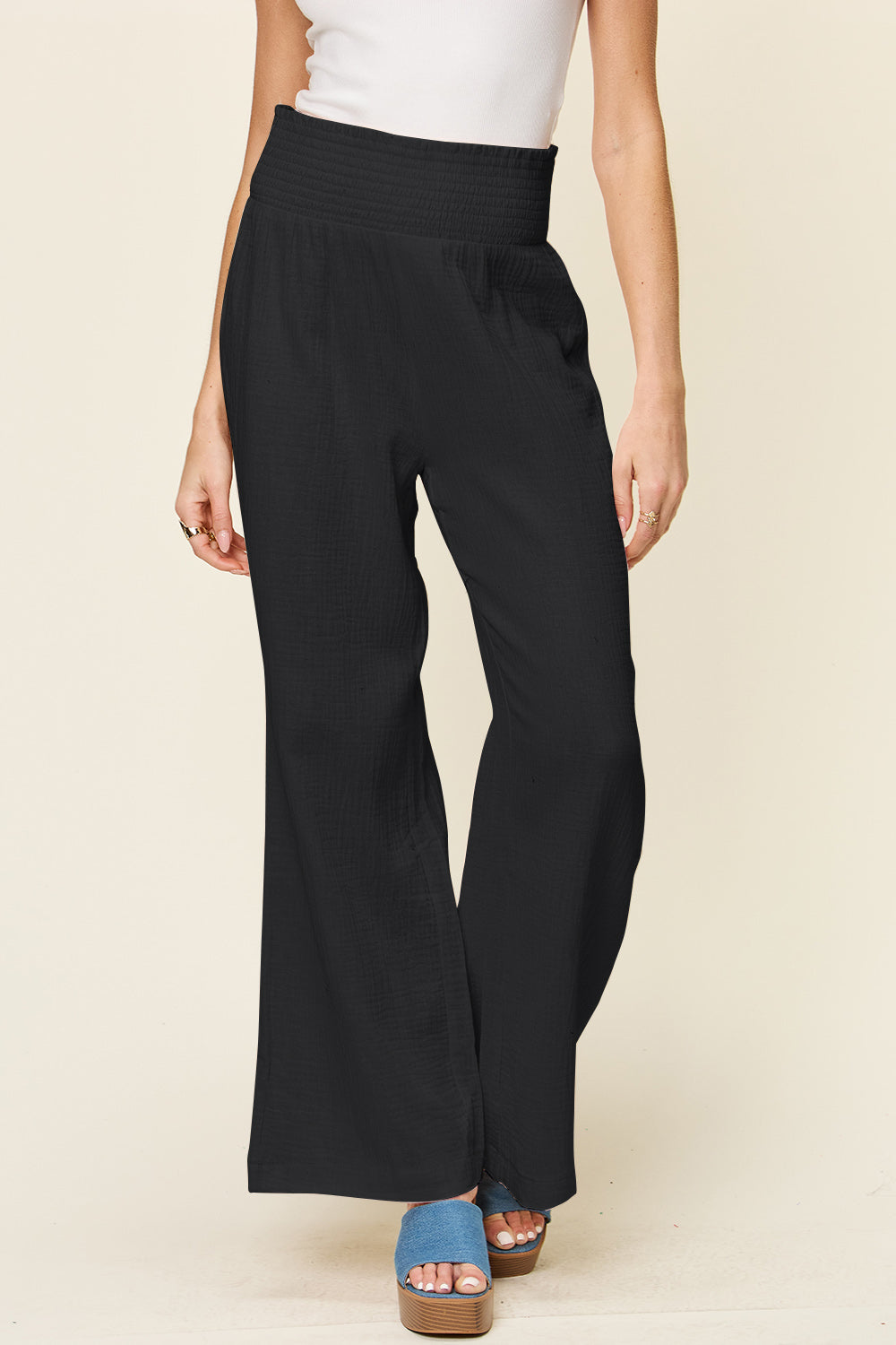 Texture smocked waist wide leg pants, opaque.