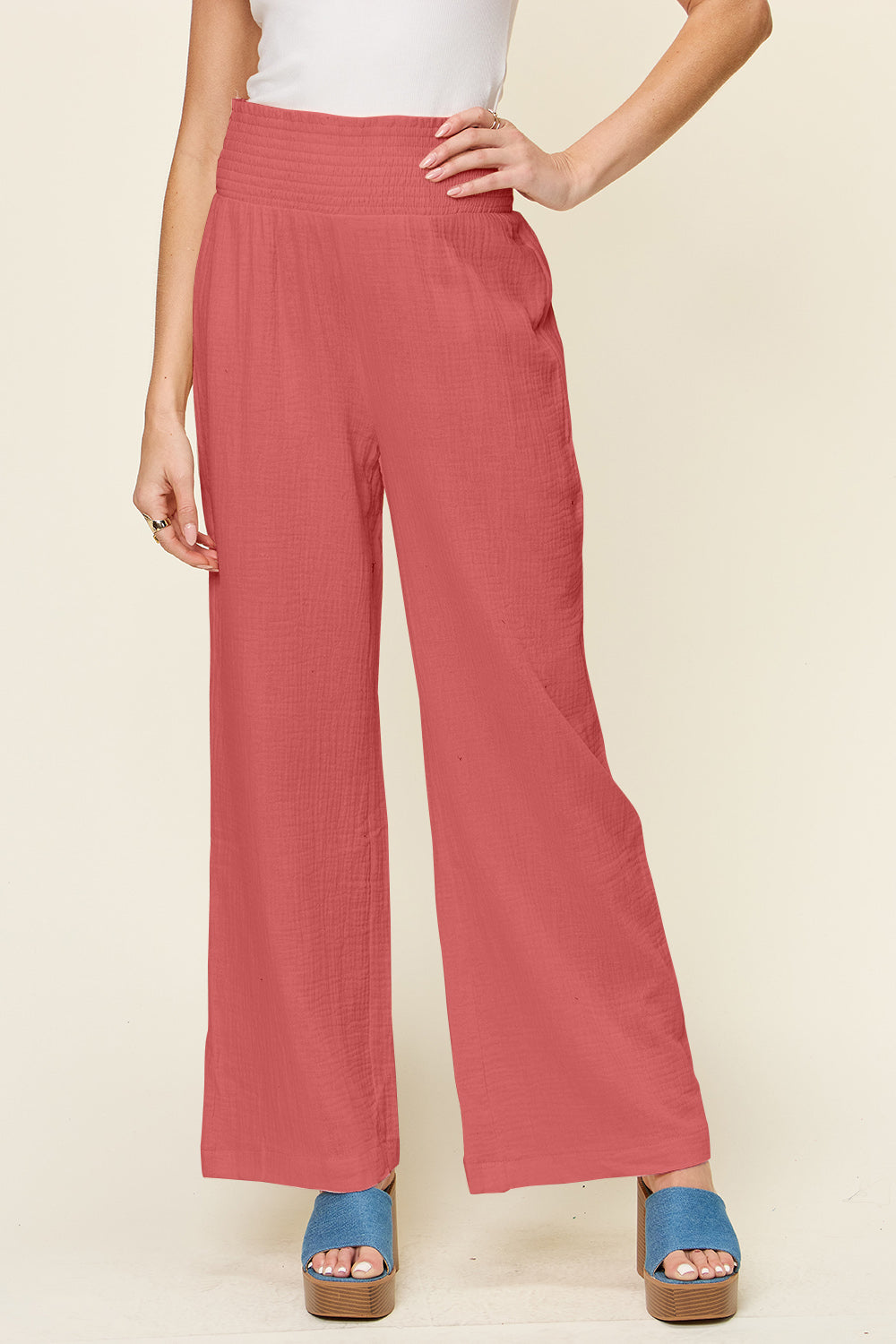 Texture smocked waist wide leg pants, opaque.