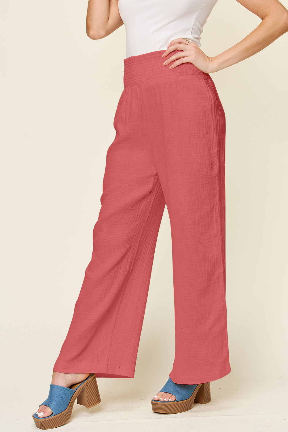 Texture smocked waist wide leg pants, opaque.