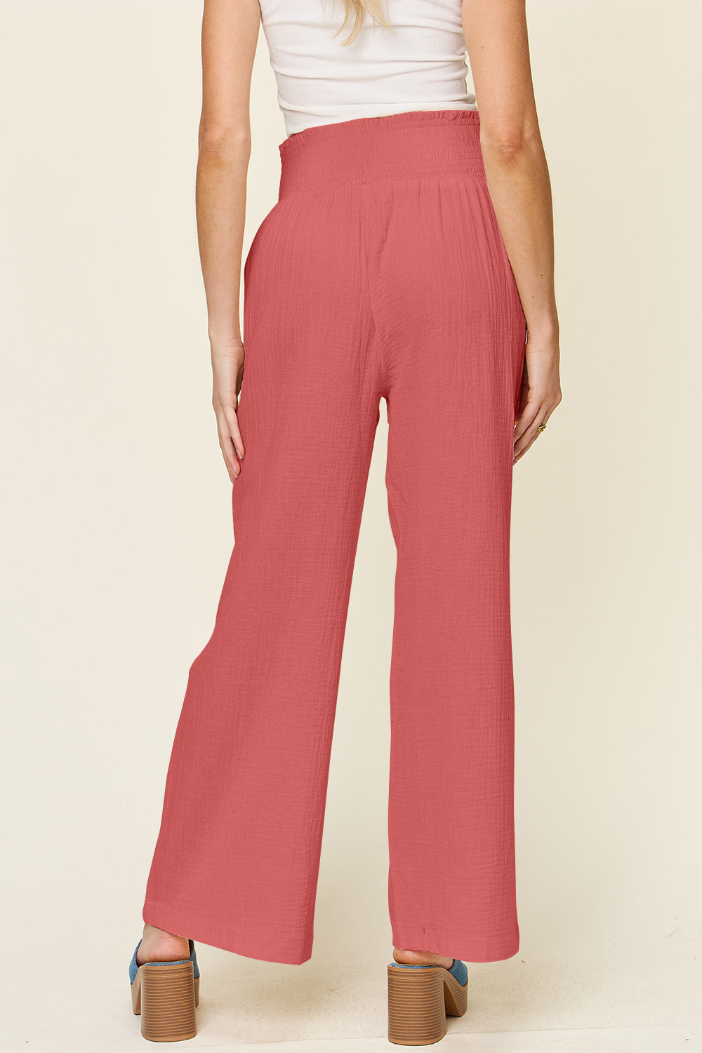 Texture smocked waist wide leg pants, opaque.