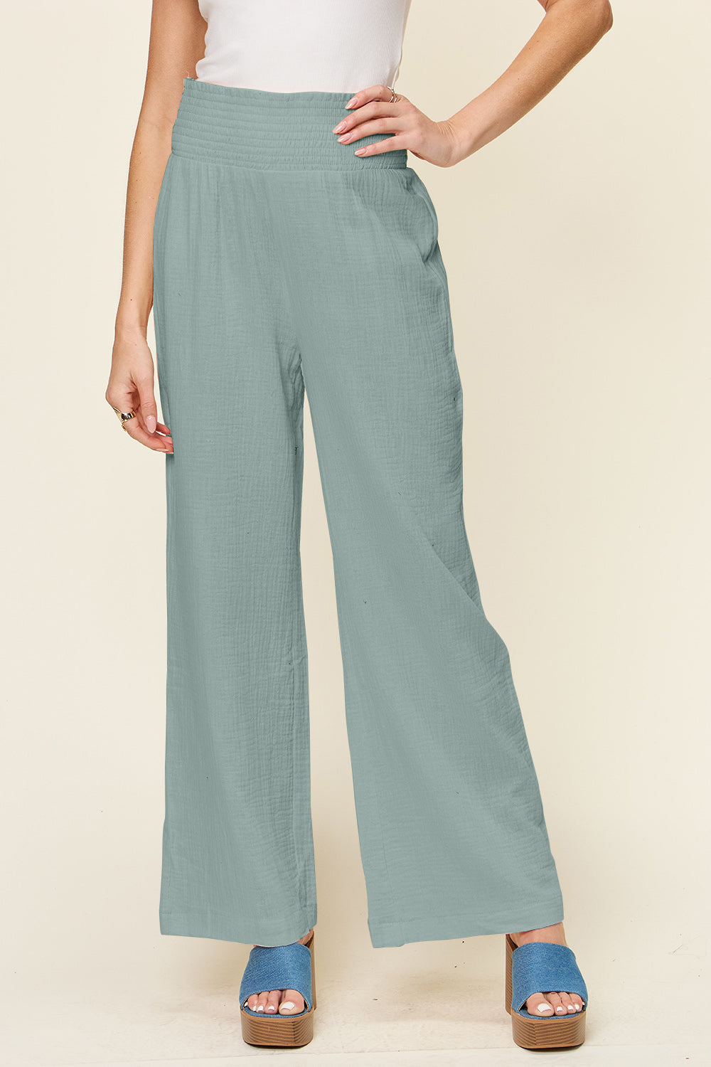 Texture smocked waist wide leg pants, opaque.
