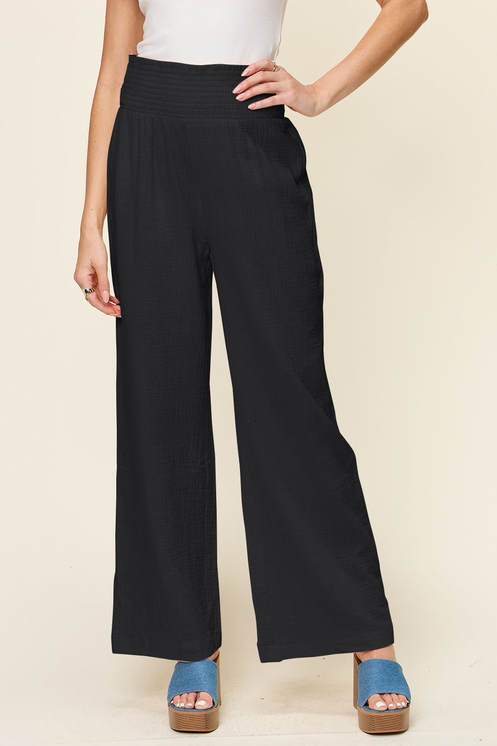 Texture smocked waist wide leg pants, opaque.