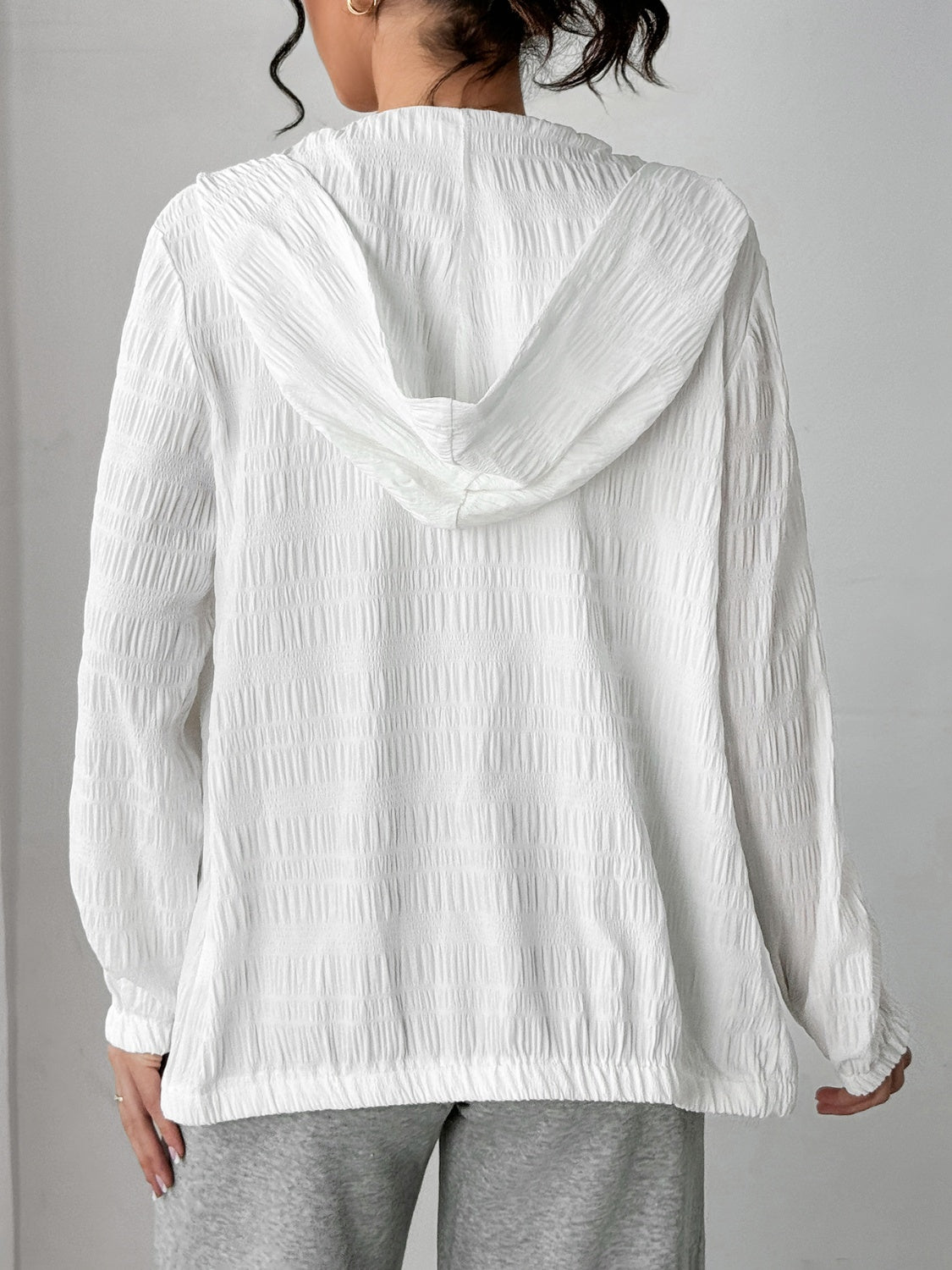 Texture zip up hooded jacket.