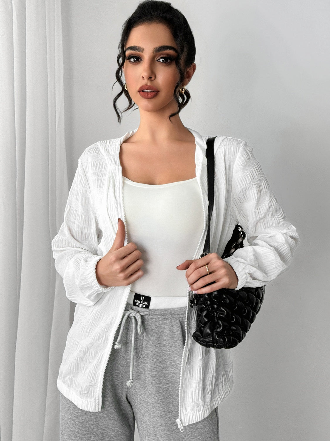 Texture zip up hooded jacket.