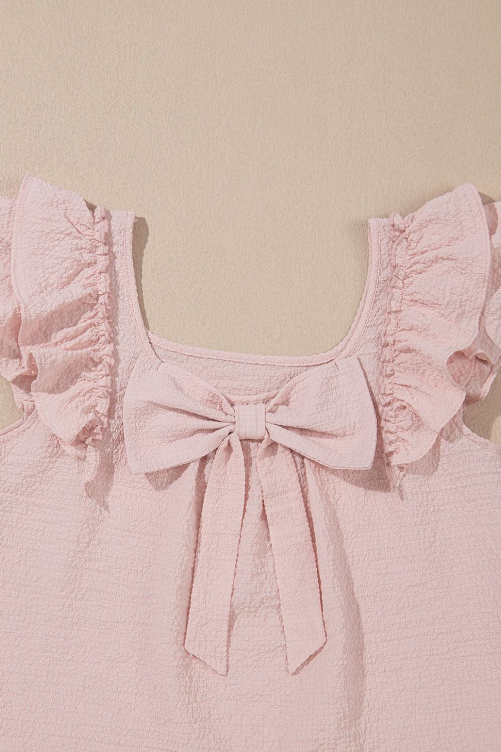 Textured Bow Knot Frilled Butterfly Sleeve Blouse.