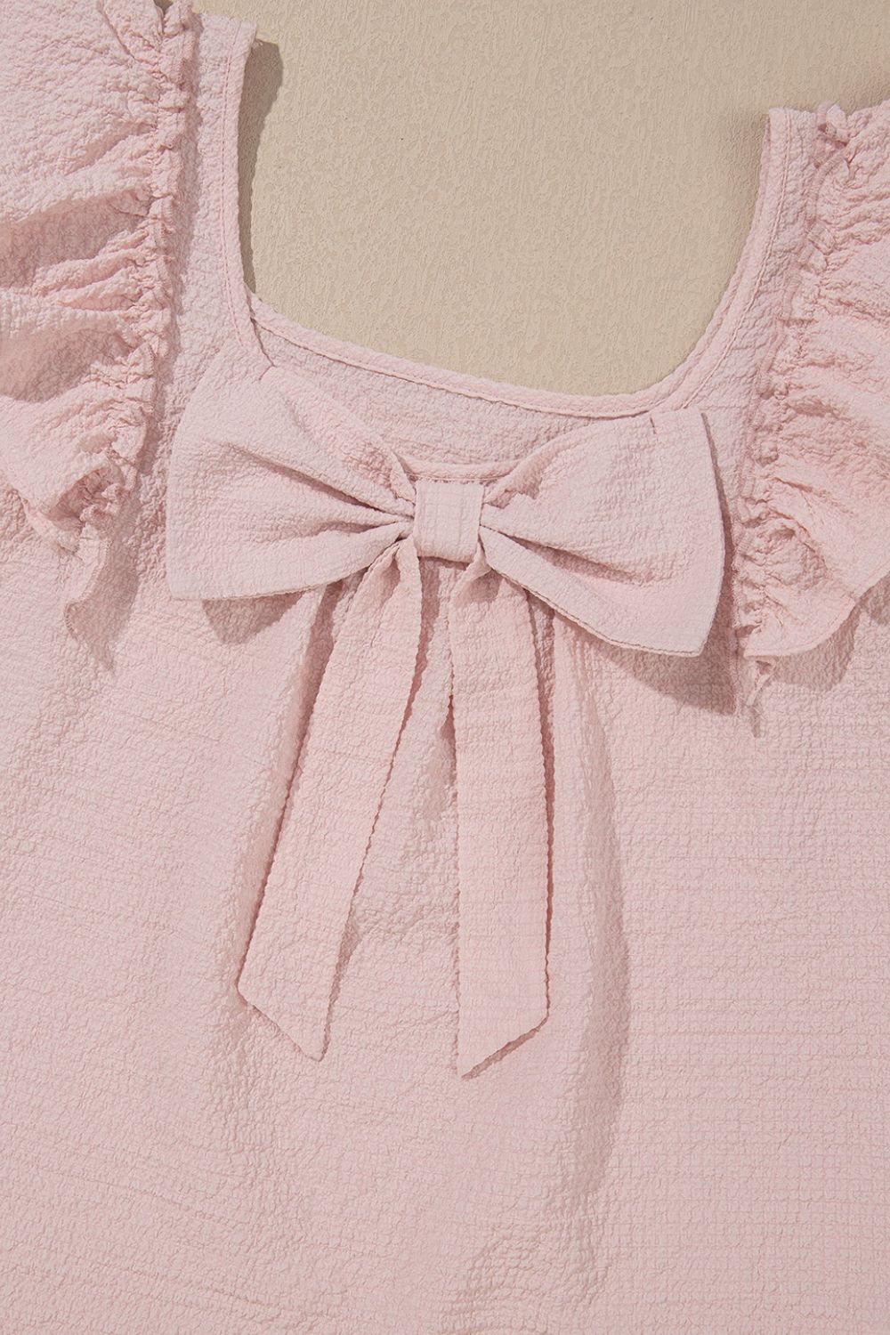 Textured Bow Knot Frilled Butterfly Sleeve Blouse.