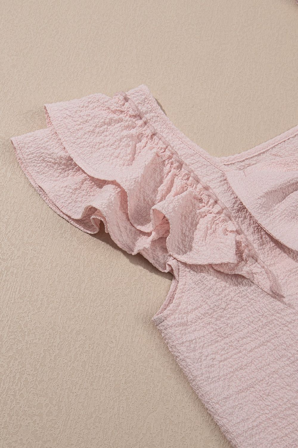 Textured Bow Knot Frilled Butterfly Sleeve Blouse.