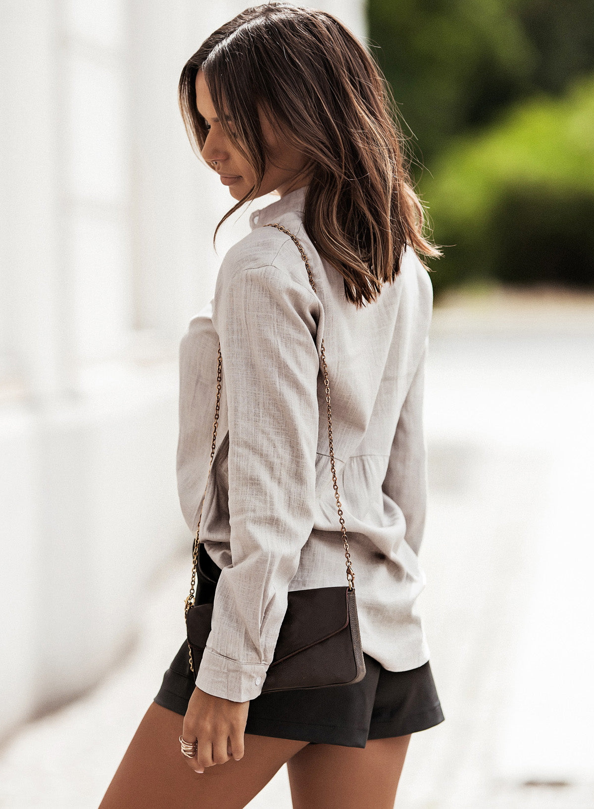 Textured Button Front Curved Hem Shirt.