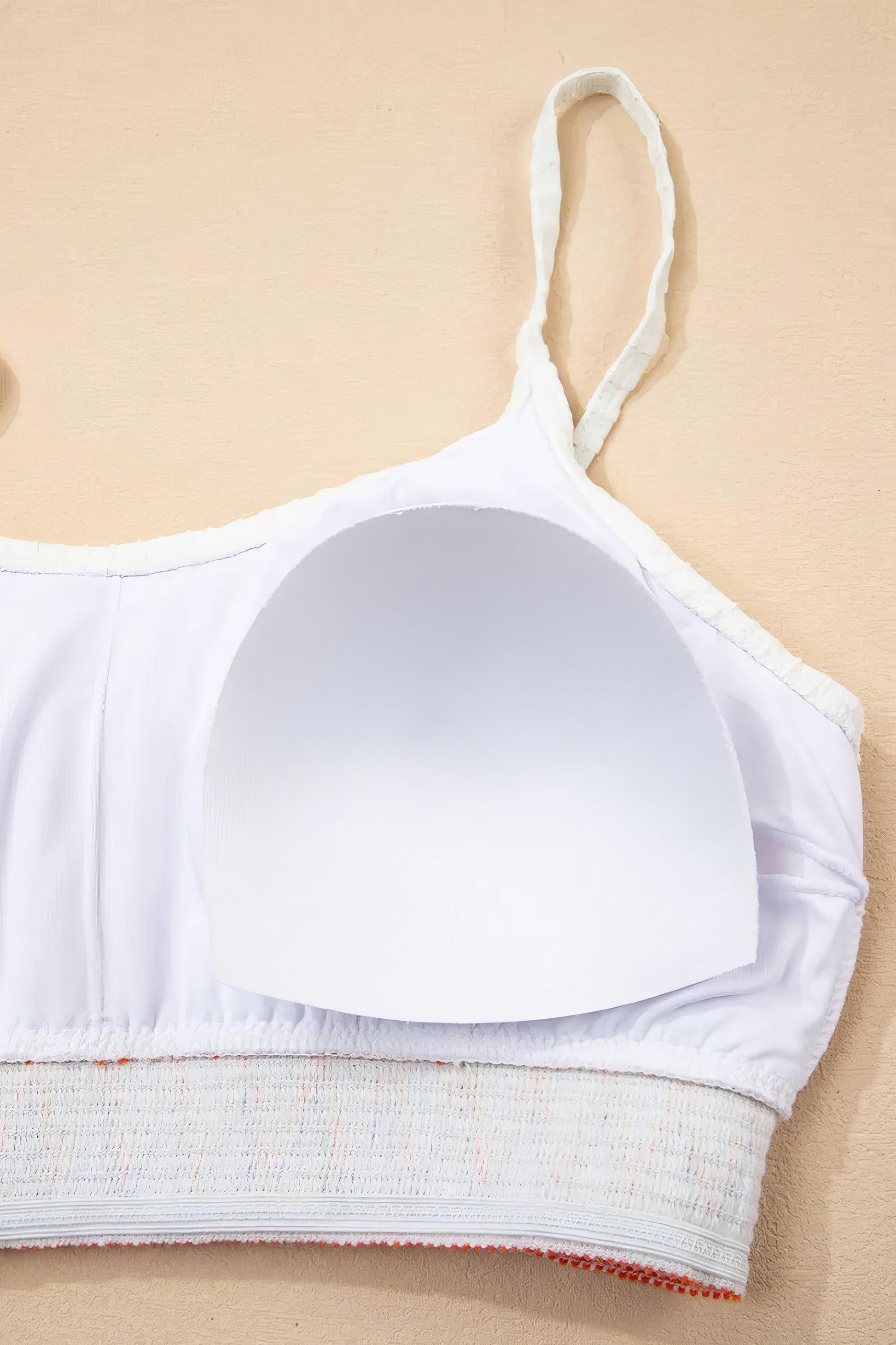 Textured contrast banding high-waist bikini swimsuit with removable padding.