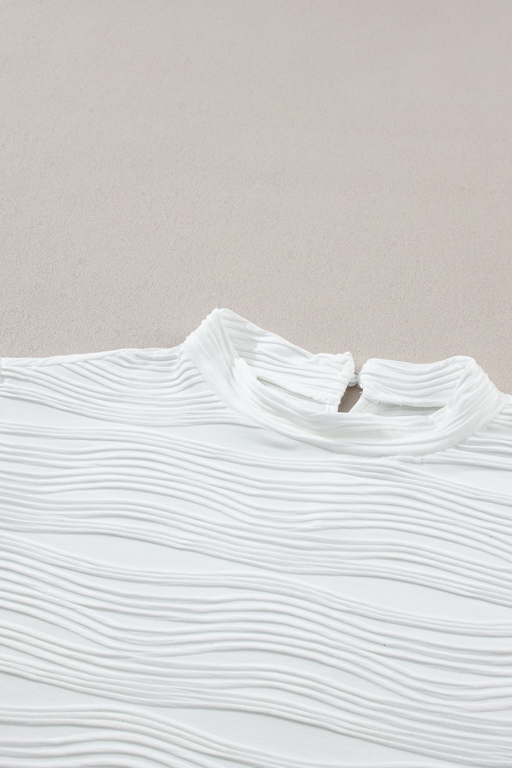 Textured Mock Neck Cap Sleeve Top.