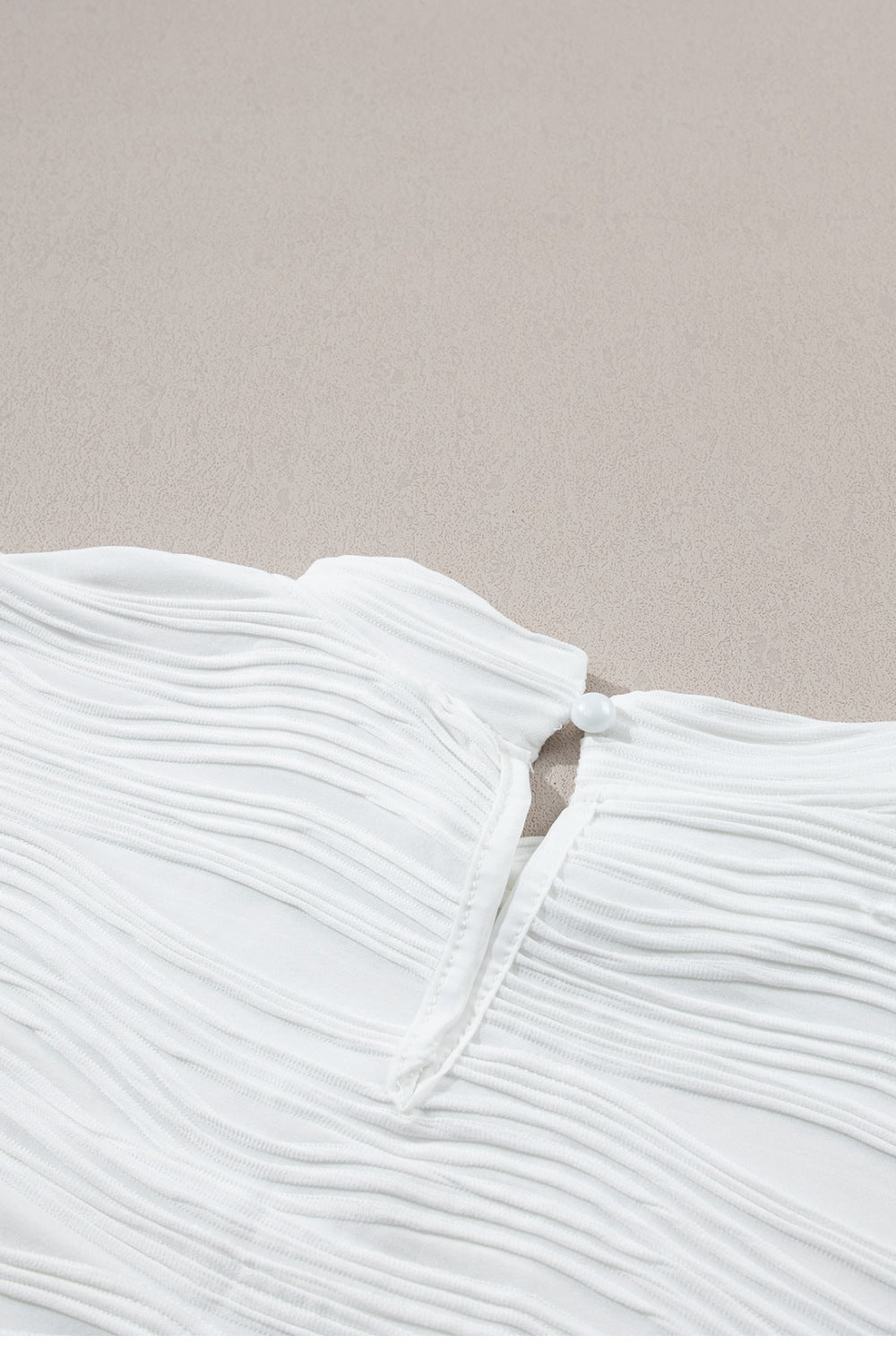 Textured Mock Neck Cap Sleeve Top.