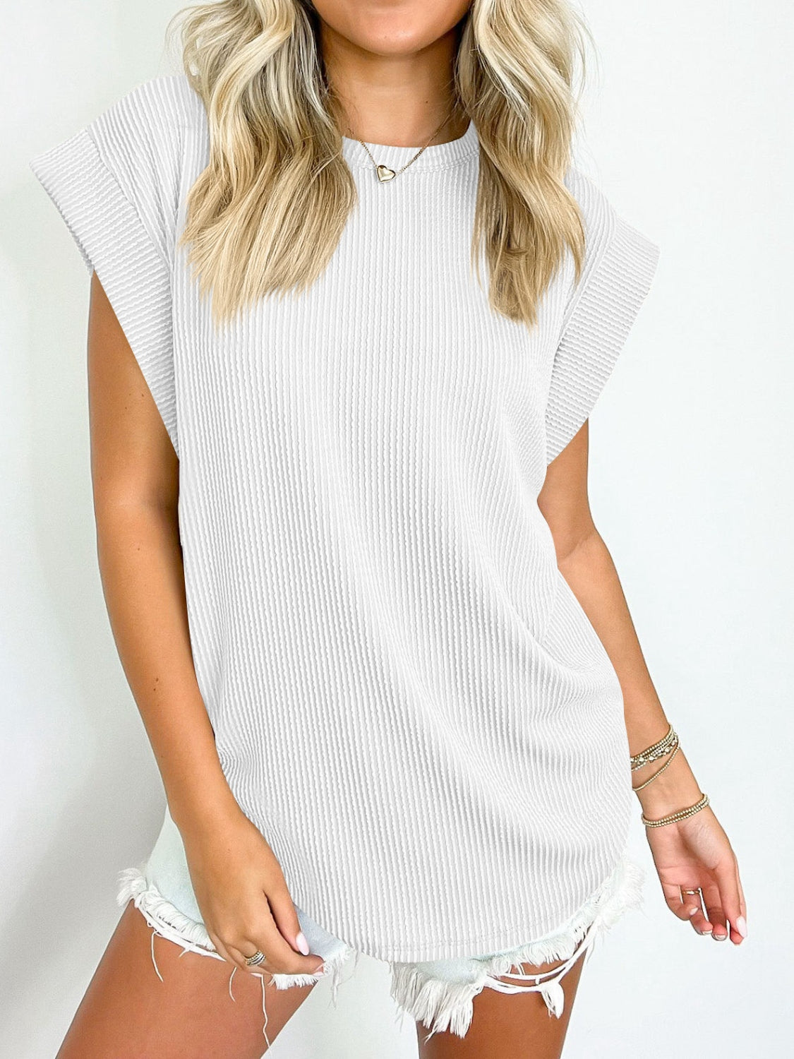 Lovelet Textured Round Neck Cap Sleeve Blouse.
