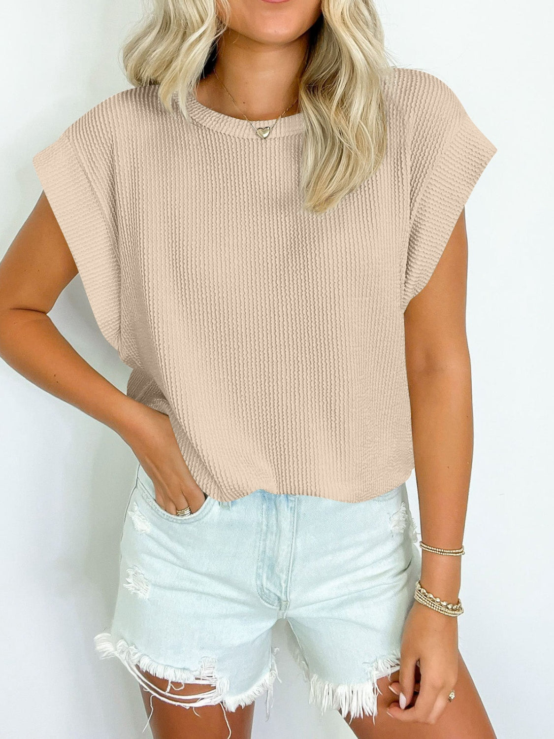 Lovelet Textured Round Neck Cap Sleeve Blouse.