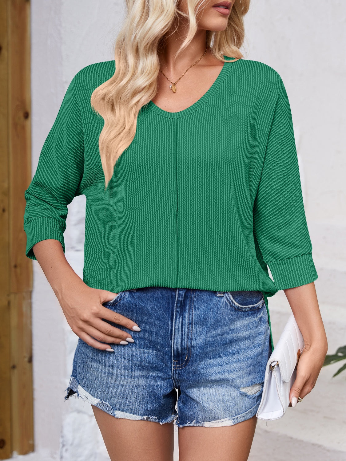 Lovelet Textured Round Neck Three-Quarter Sleeve Blouse.