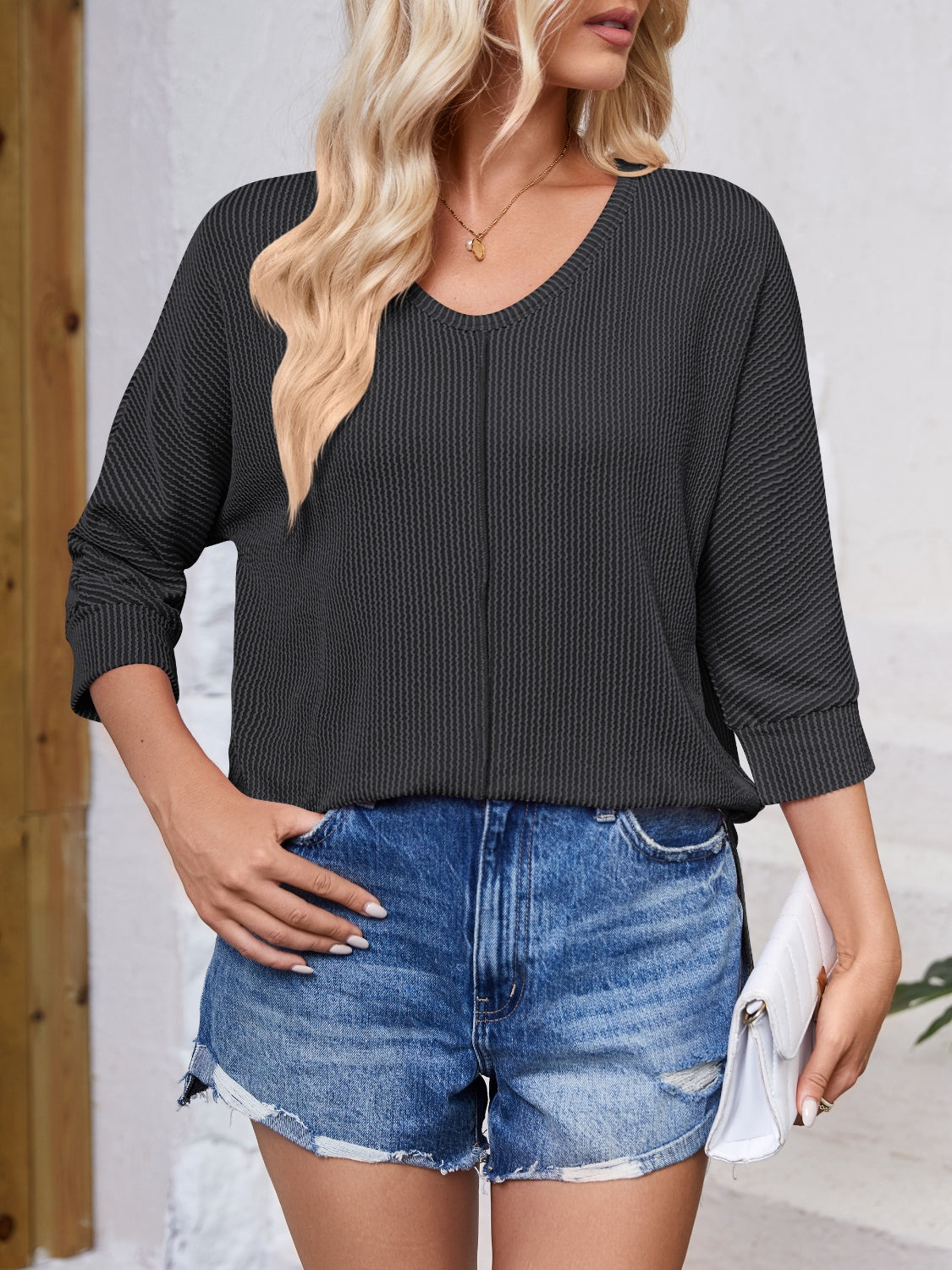Lovelet Textured Round Neck Three-Quarter Sleeve Blouse.