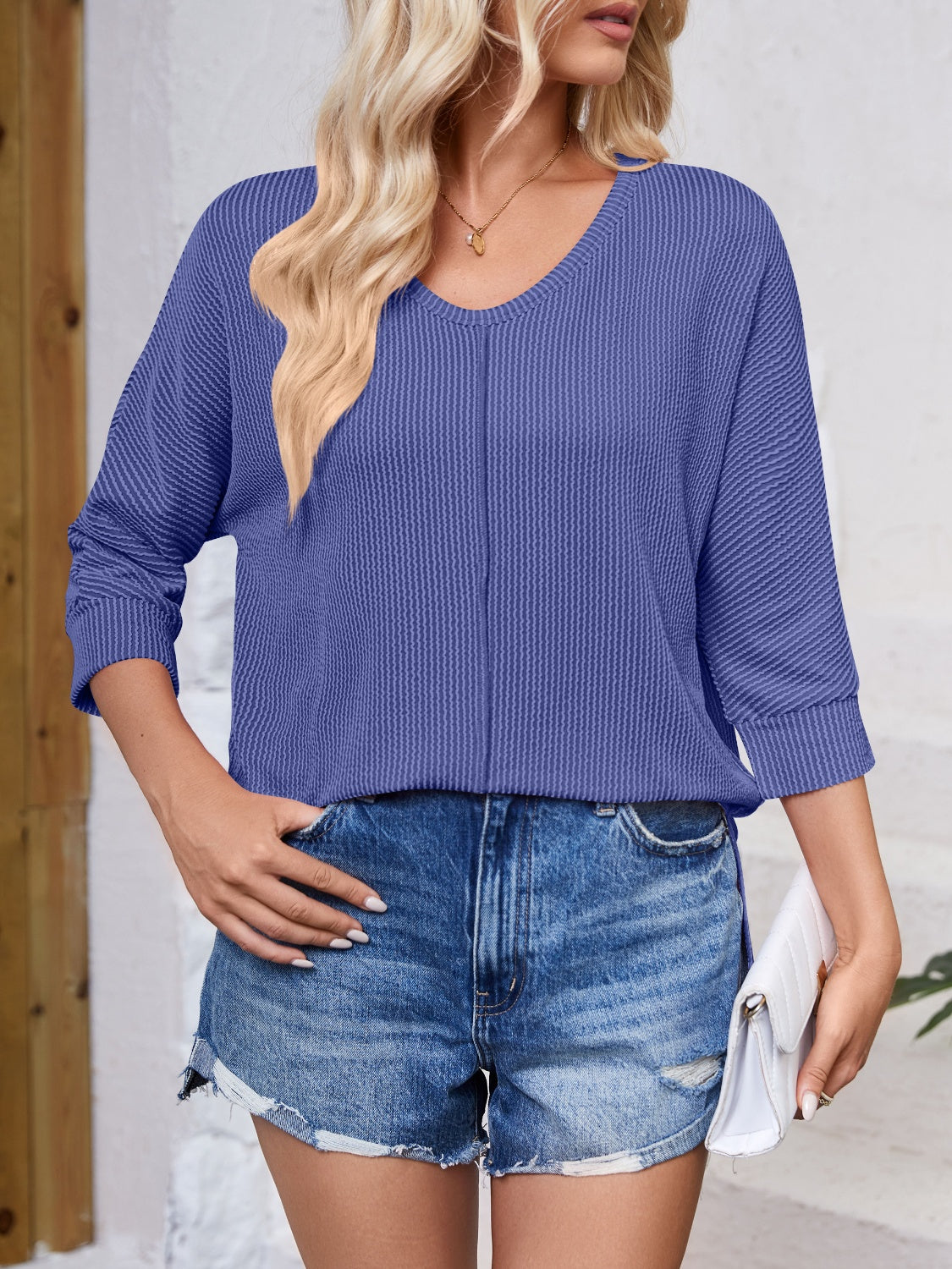 Lovelet Textured Round Neck Three-Quarter Sleeve Blouse.