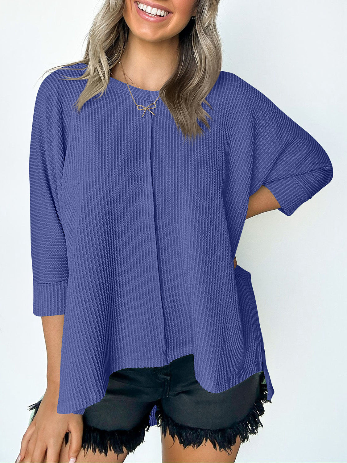 Lovelet Textured Round Neck Three-Quarter Sleeve Blouse.