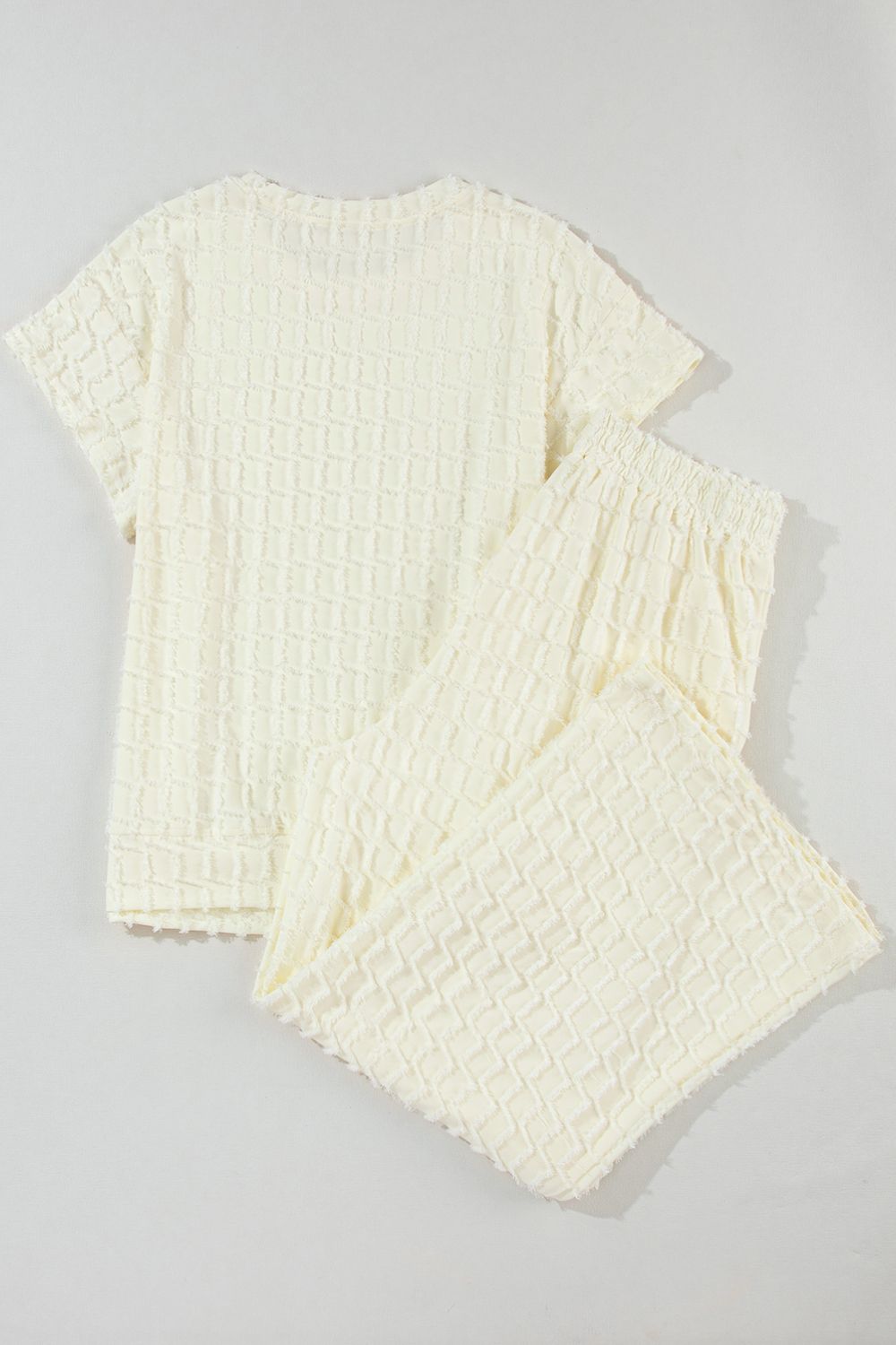Textured Round Neck Top and Pants Set.
