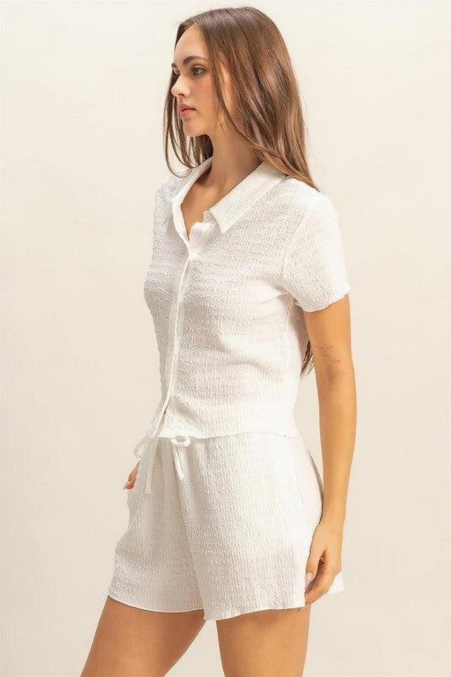 Women's textured short sleeve top and drawstring shorts knit set with buttons and pockets