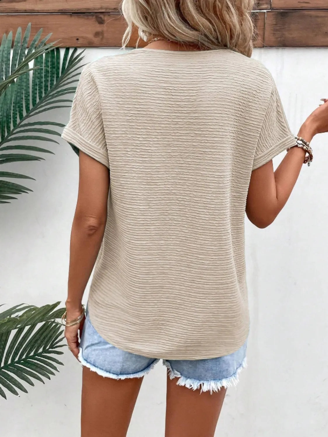 Textured Solid Color Short Sleeve Top.