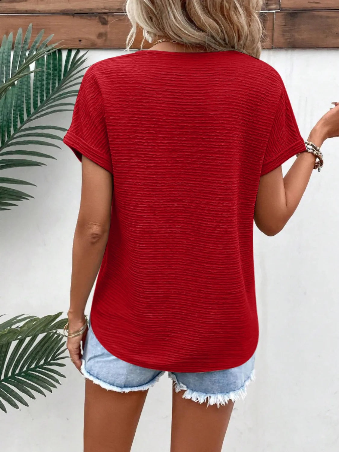 Textured Solid Color Short Sleeve Top.