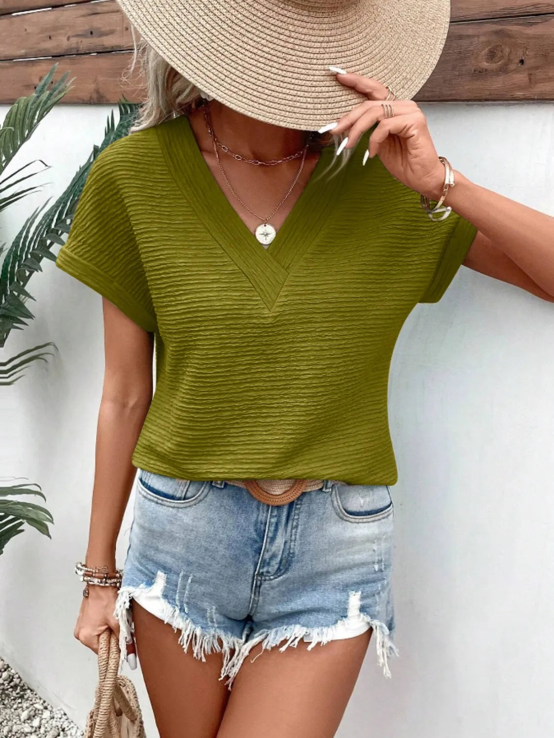 Textured Solid Color Short Sleeve Top.