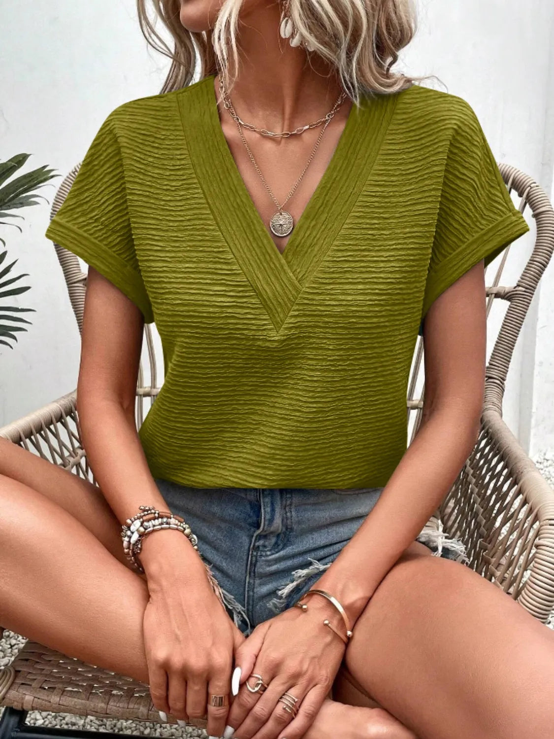 Textured Solid Color Short Sleeve Top.