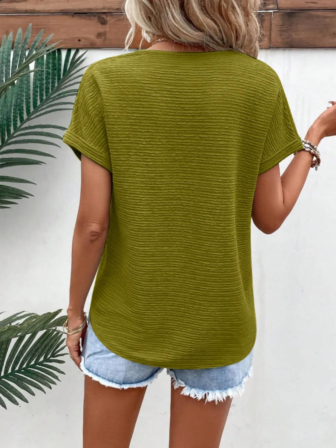 Textured Solid Color Short Sleeve Top.