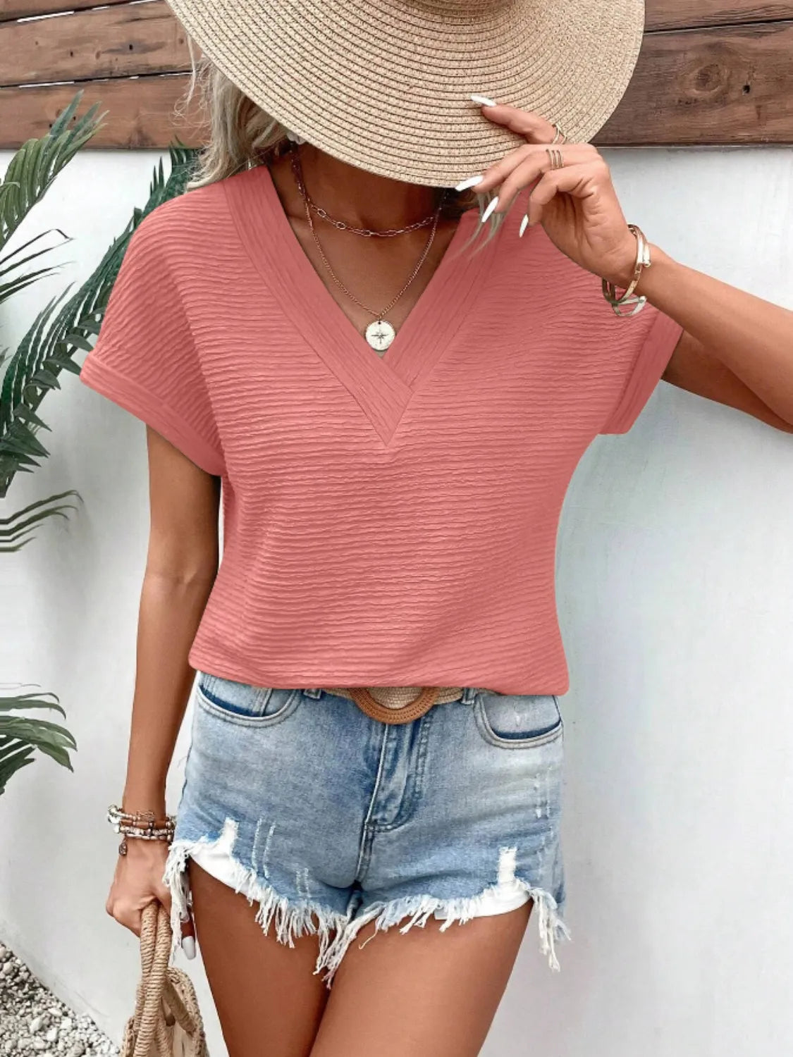 Textured Solid Color Short Sleeve Top.