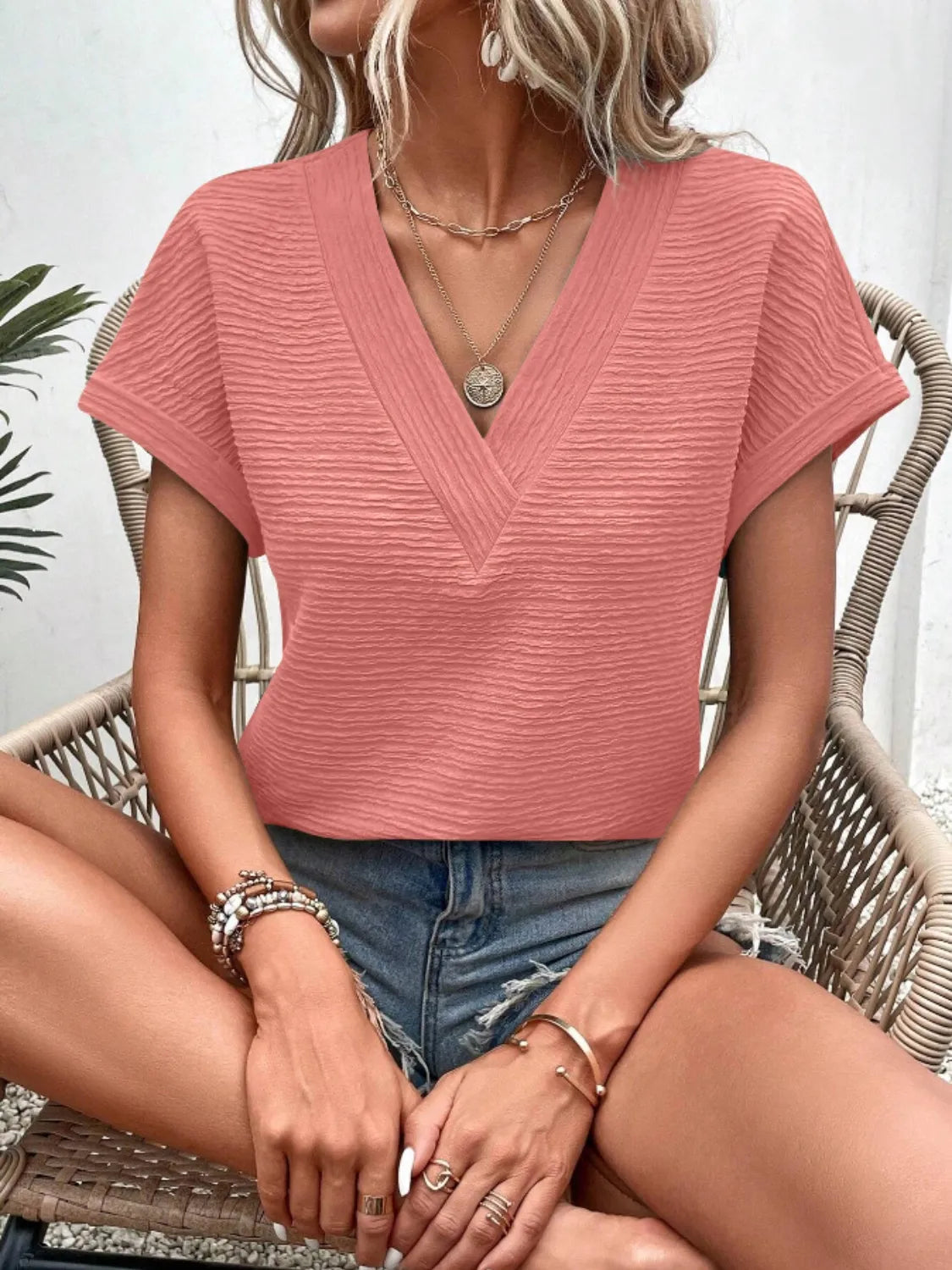 Textured Solid Color Short Sleeve Top.