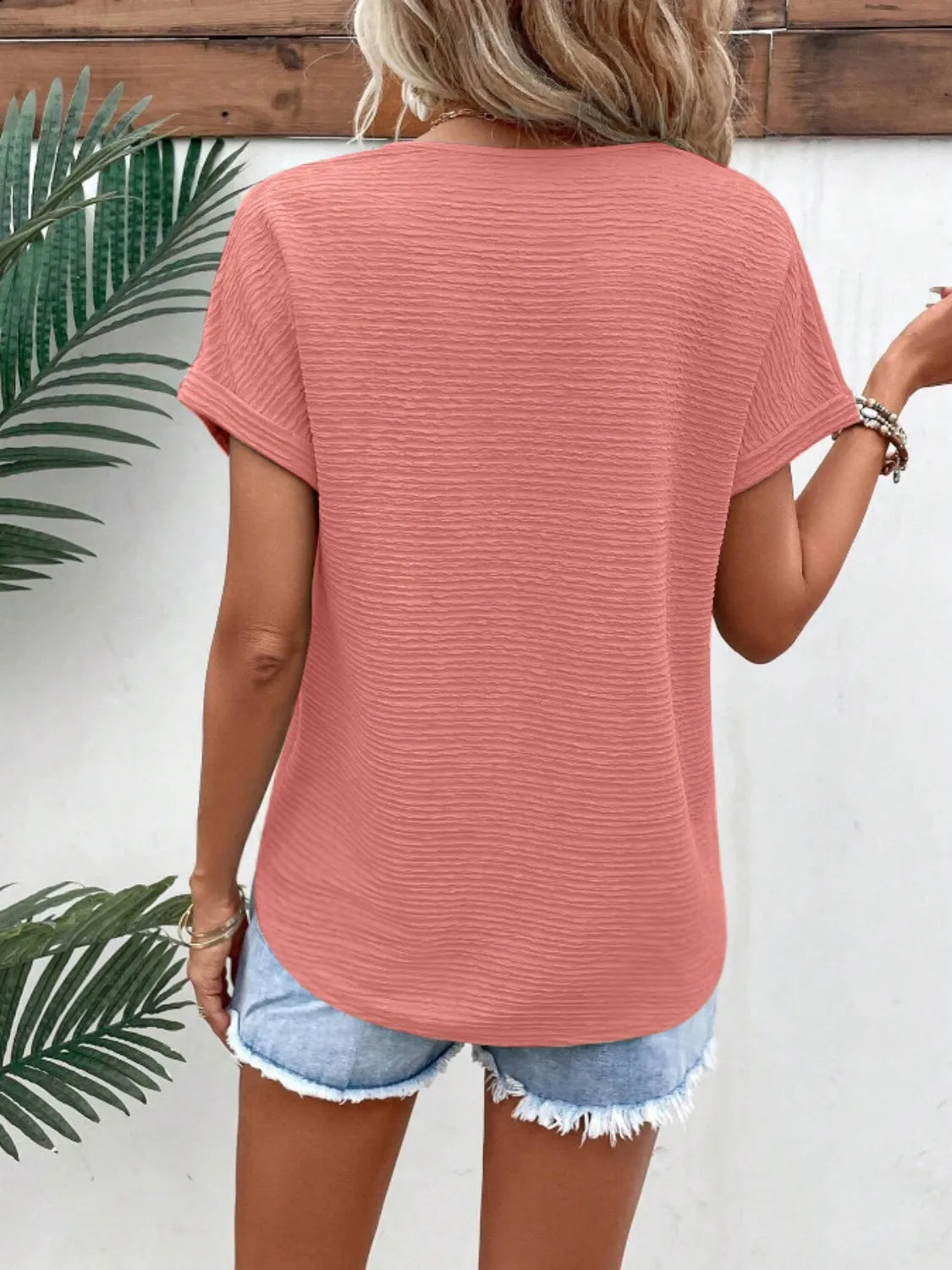 Textured Solid Color Short Sleeve Top.