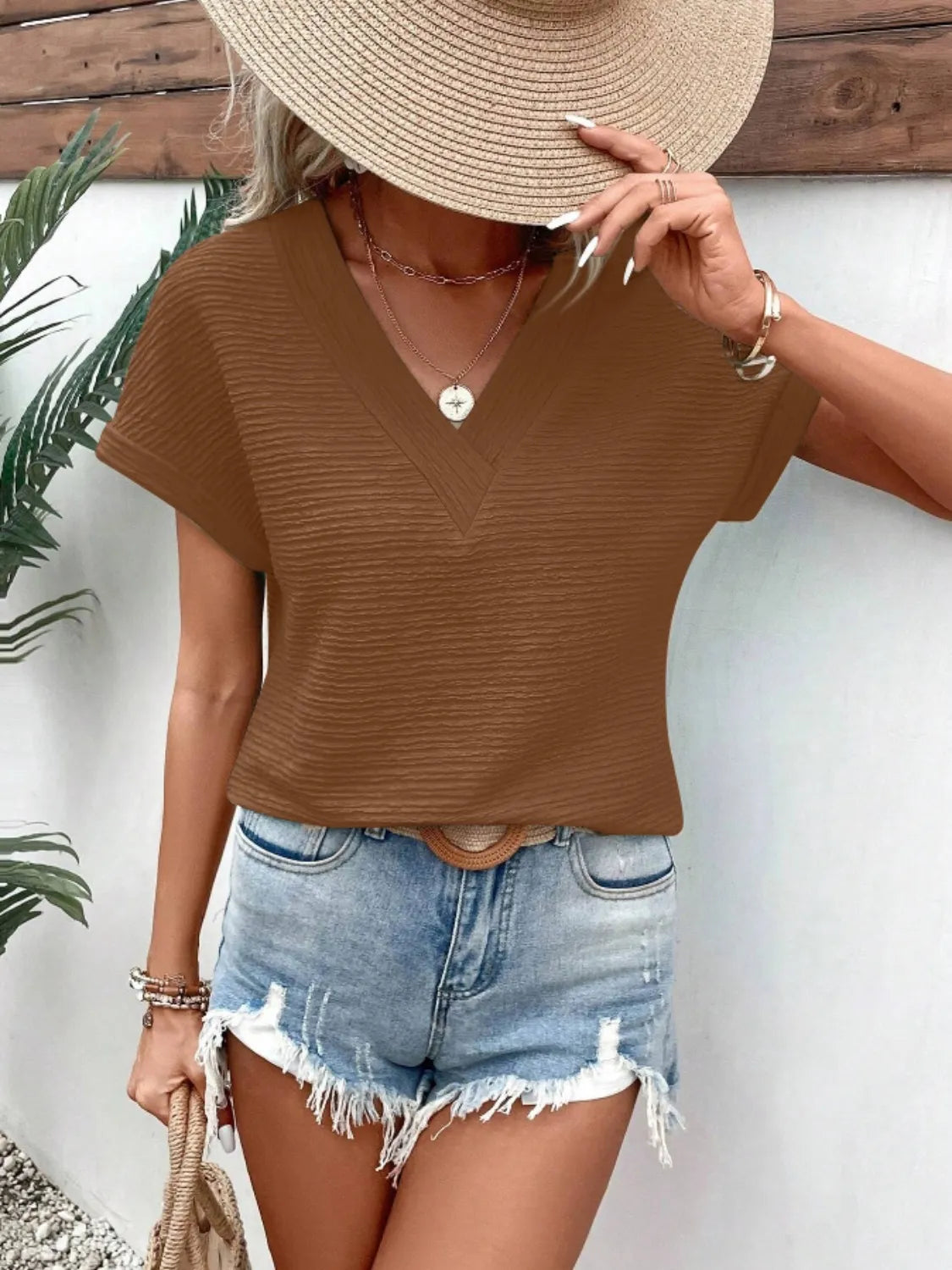 Textured Solid Color Short Sleeve Top.