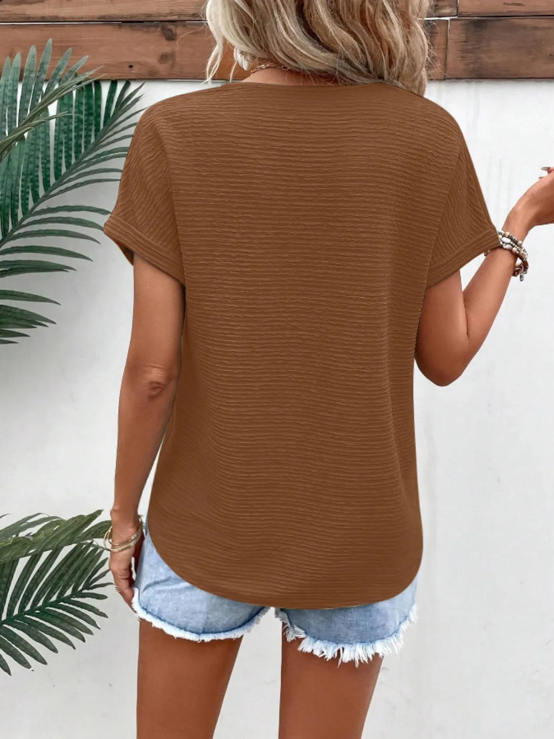 Textured Solid Color Short Sleeve Top.