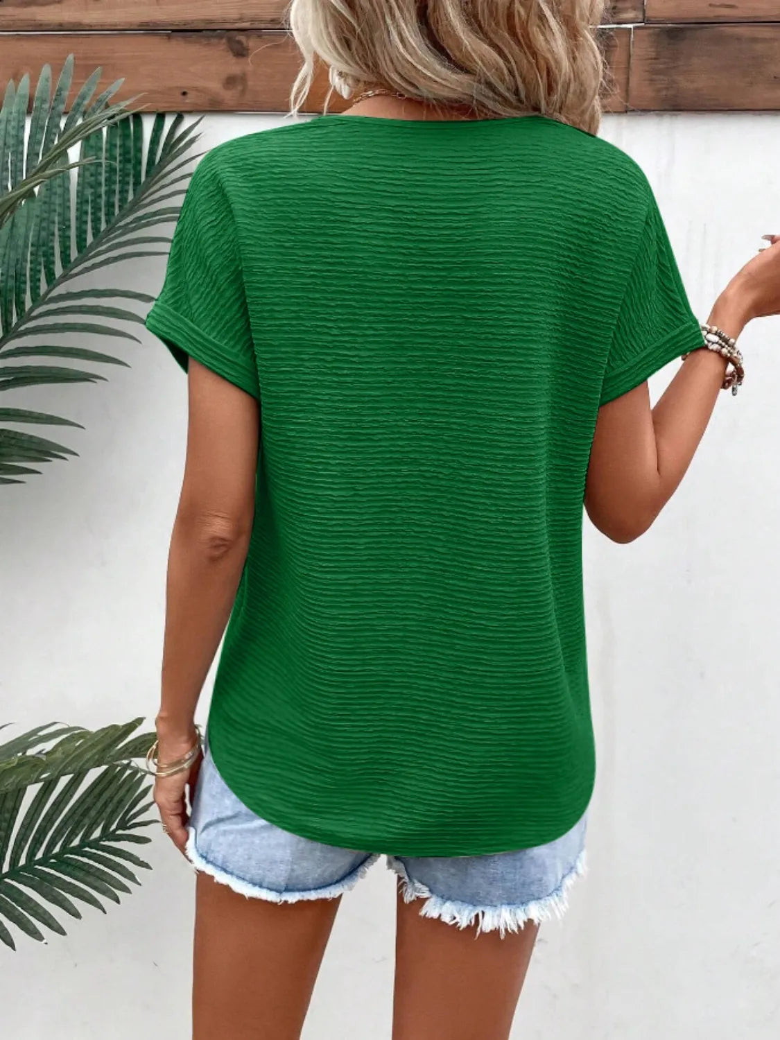 Textured Solid Color Short Sleeve Top.