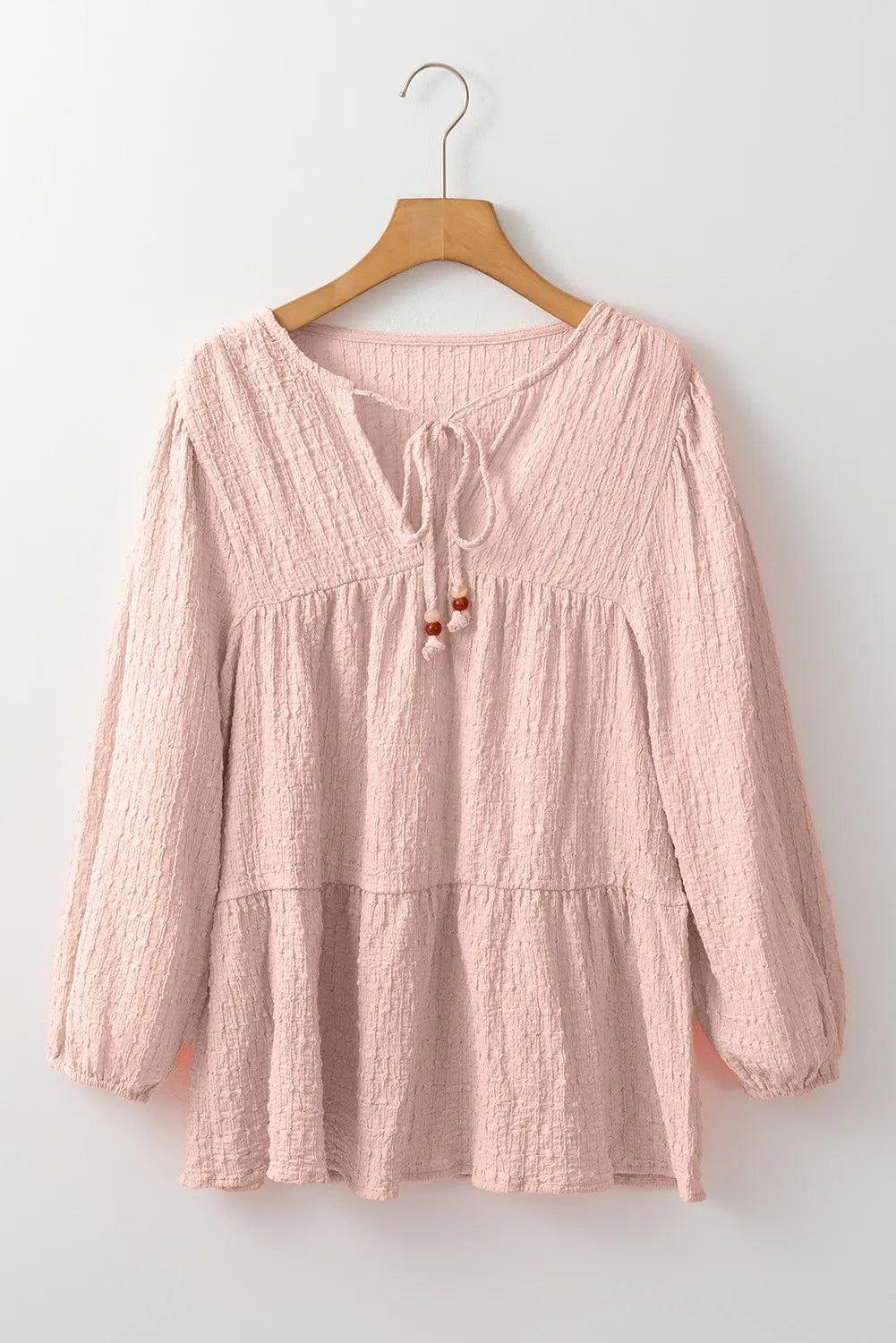 Textured Tie Neck Three-Quarter Sleeve Blouse.