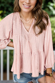 Textured Tie Neck Three-Quarter Sleeve Blouse.